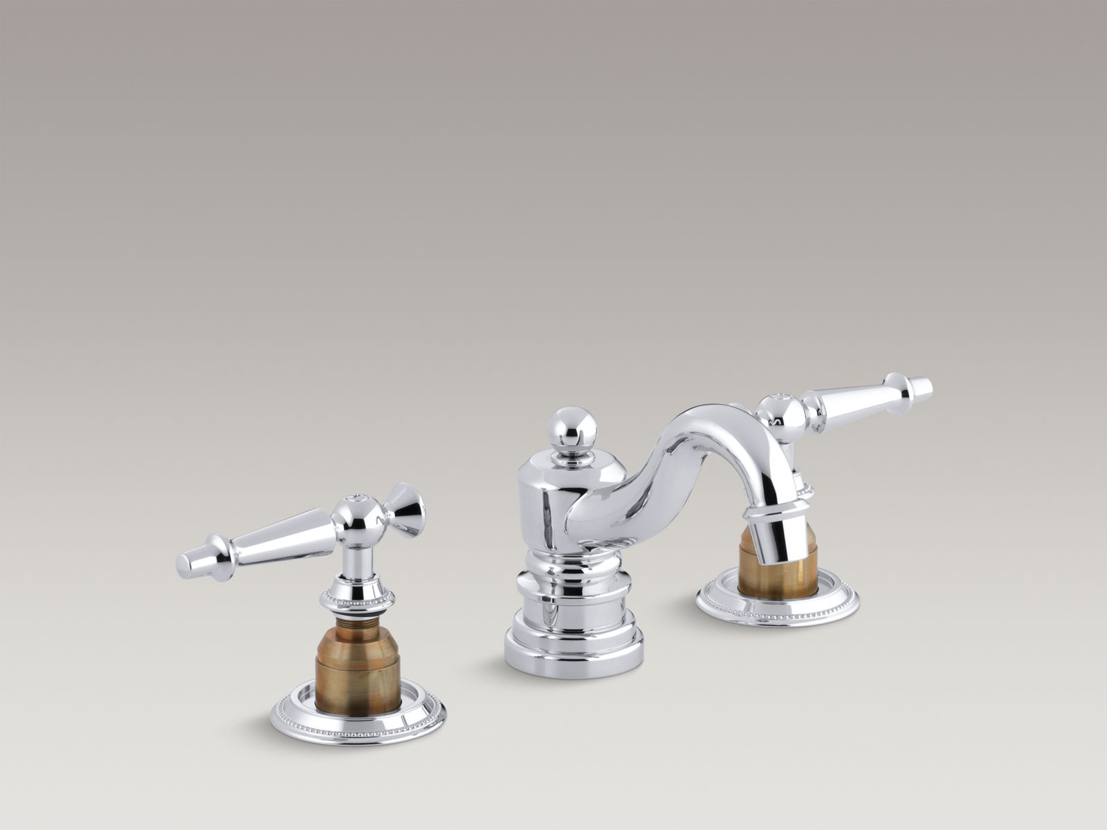 Antique widespread bathroom sink faucet with lever handles, requires ceramic skirts