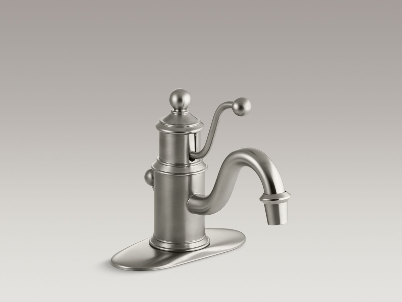 Antique single-hole bathroom sink faucet with lever handle and escutcheon