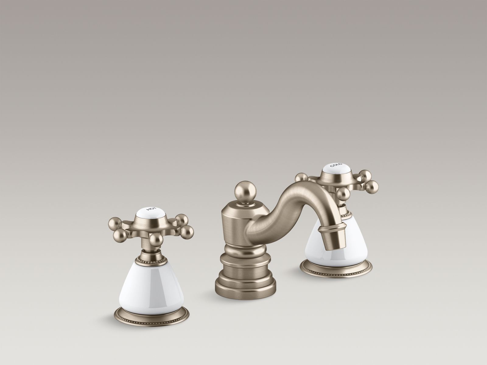 19500-antique-widespread-bathroom-sink-faucet-with-6-prong-handles-and-ceramic-skirts-3.jpg Antique widespread bathroom sink faucet with 6-prong handles and ceramic skirts