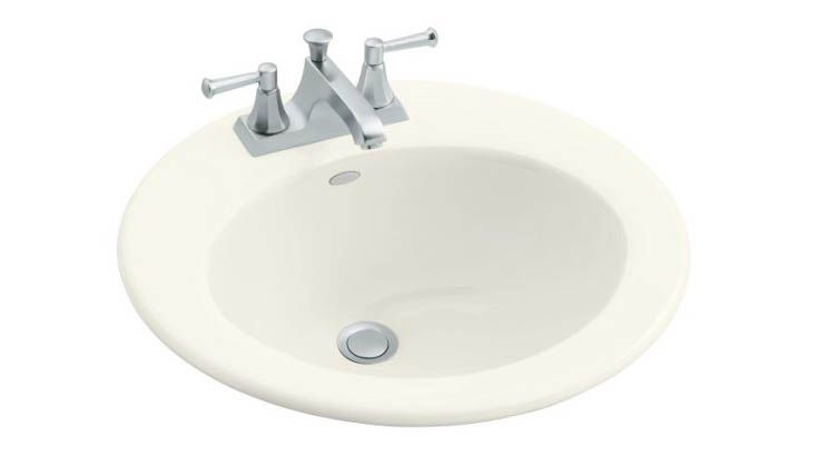Radiant(R) self-rimming lavatory with single-hole faucet drilling and right-hand soap/lotion dispenser hole drilling
