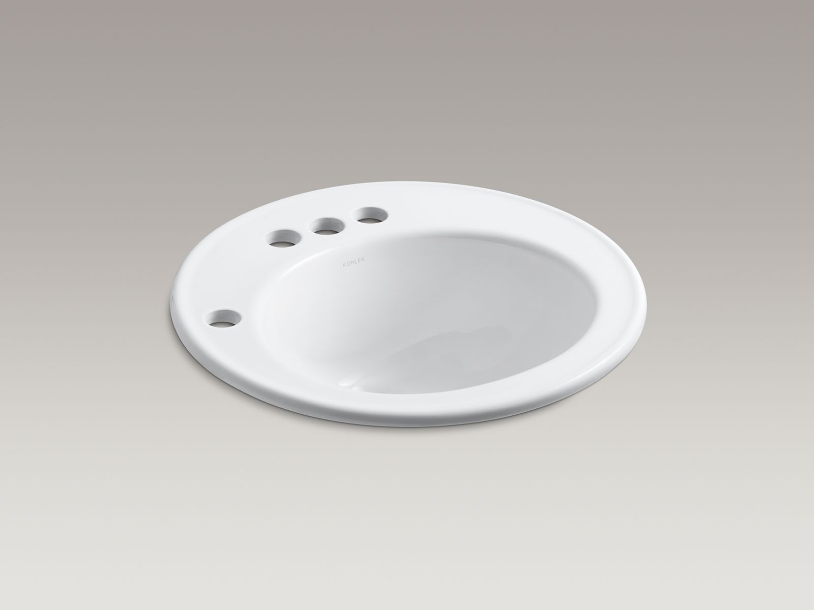 Brookline(R) 19" diameter drop-in bathroom sink with 4" centerset faucet holes and left-hand soap/lotion dispenser hole
