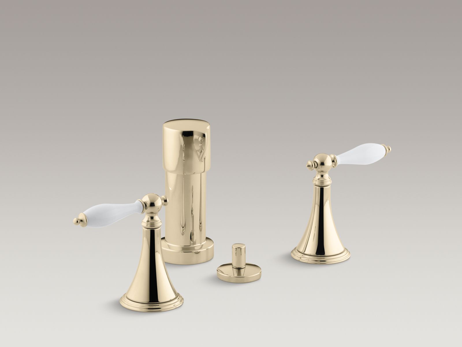 Finial(R) vertical spray bidet faucet with lever handles and White handle inserts