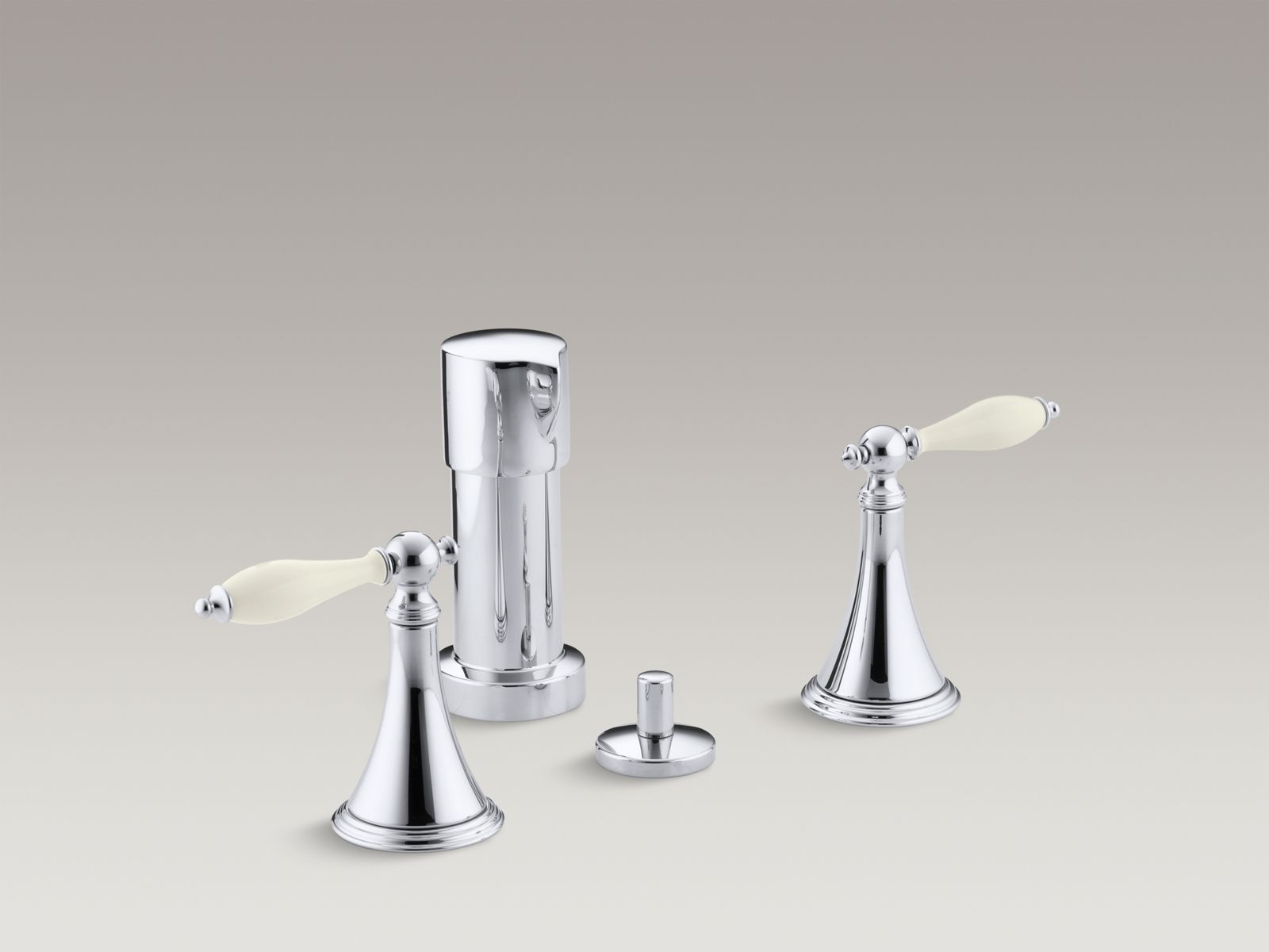 Finial(R) vertical spray bidet faucet with lever handles and Biscuit handle inserts