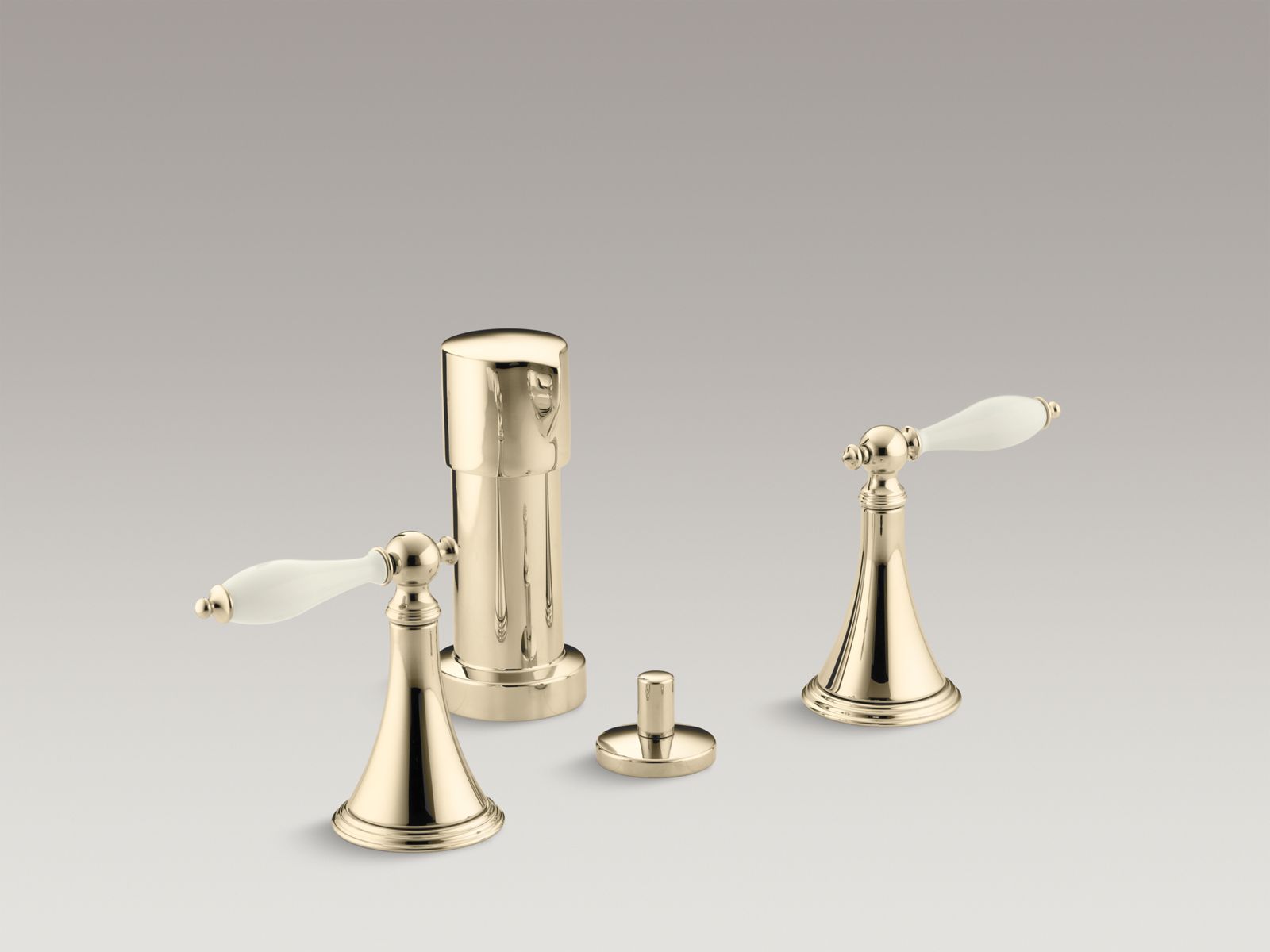 Finial(R) vertical spray bidet faucet with lever handles and Biscuit handle inserts