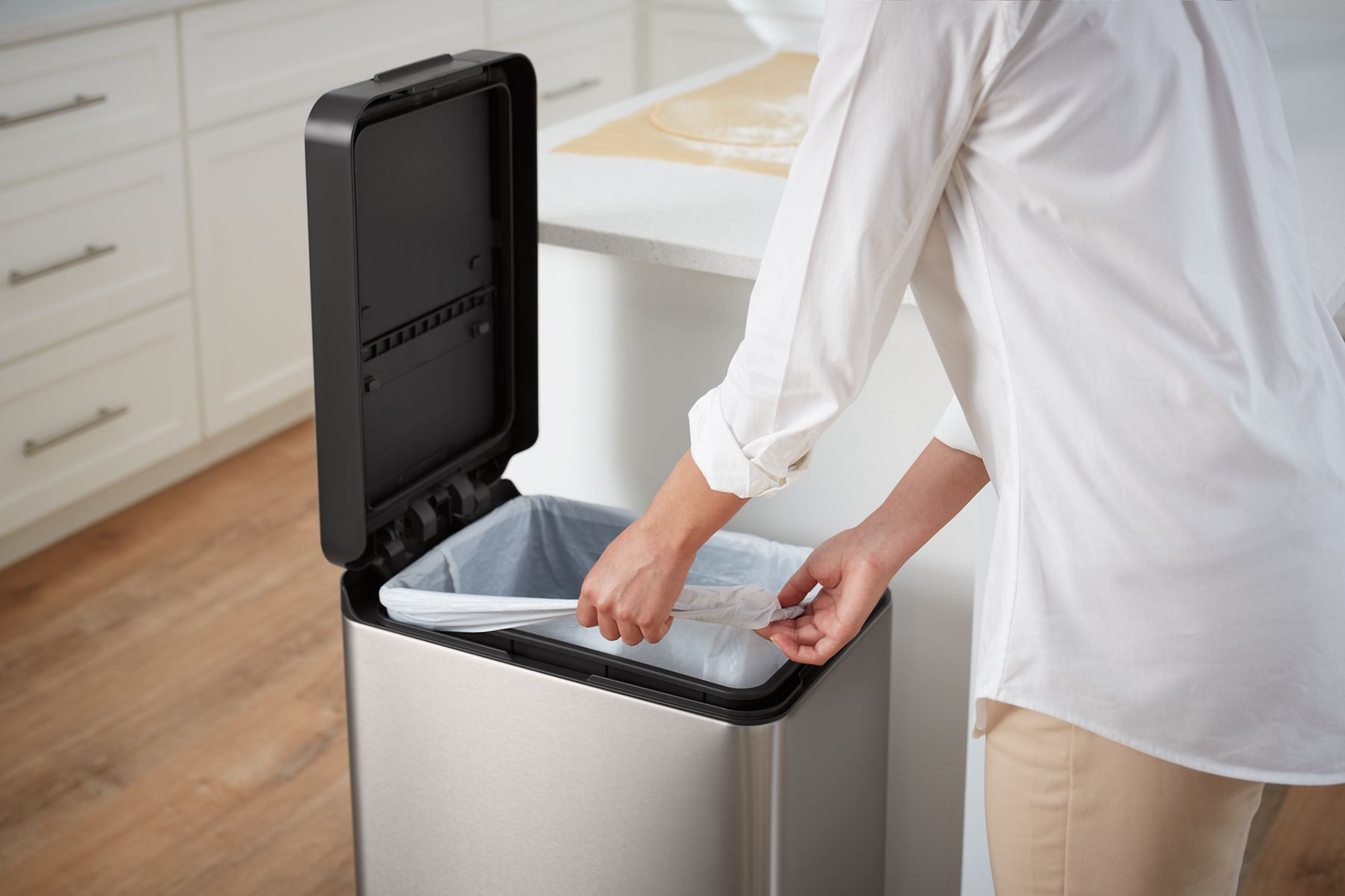 33598-13-gallon-stainless-steel-slim-step-trash-can-with-bifold-lid-10.jpg 13-gallon stainless steel slim step trash can with bifold lid