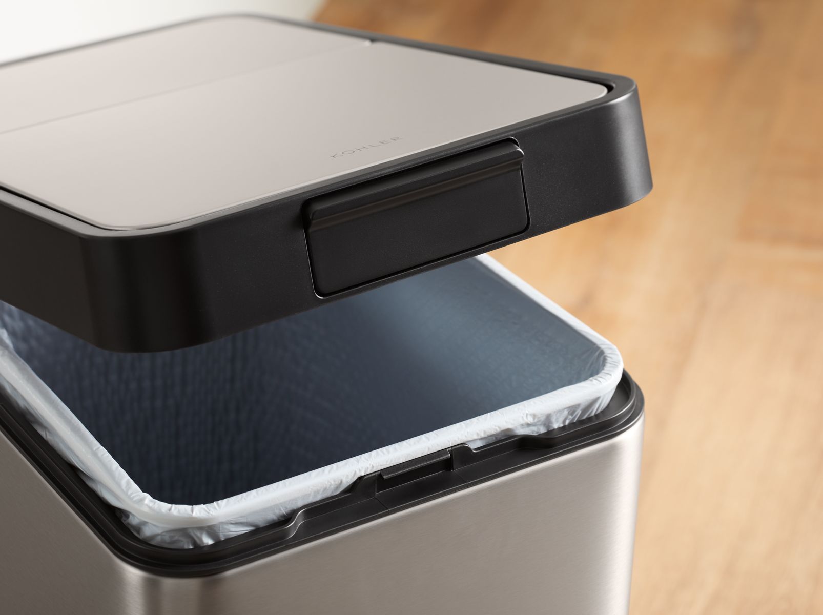 33598-13-gallon-stainless-steel-slim-step-trash-can-with-bifold-lid-5.jpg 13-gallon stainless steel slim step trash can with bifold lid