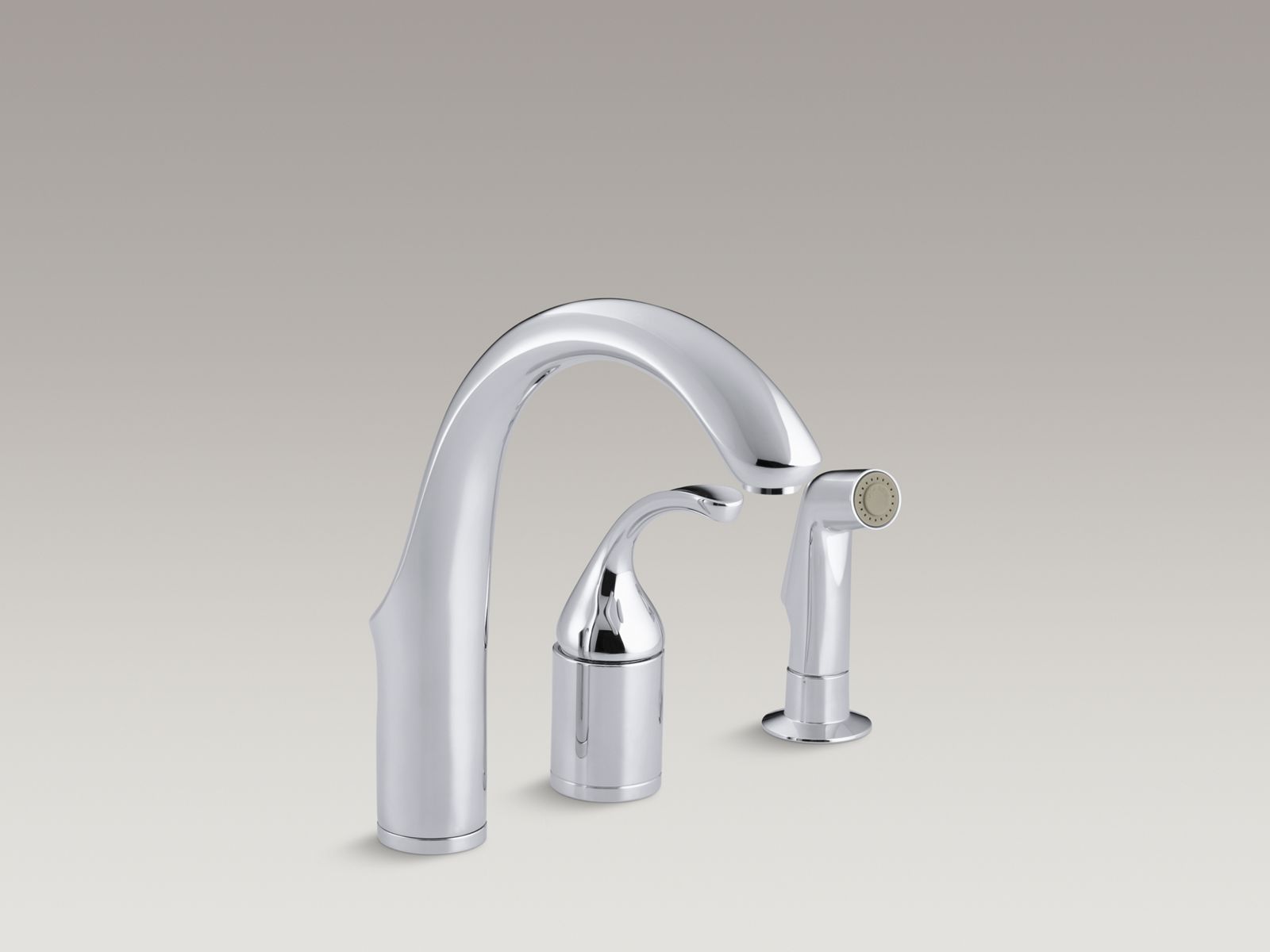Forté® Three-hole remote valve kitchen sink faucet with sidespray