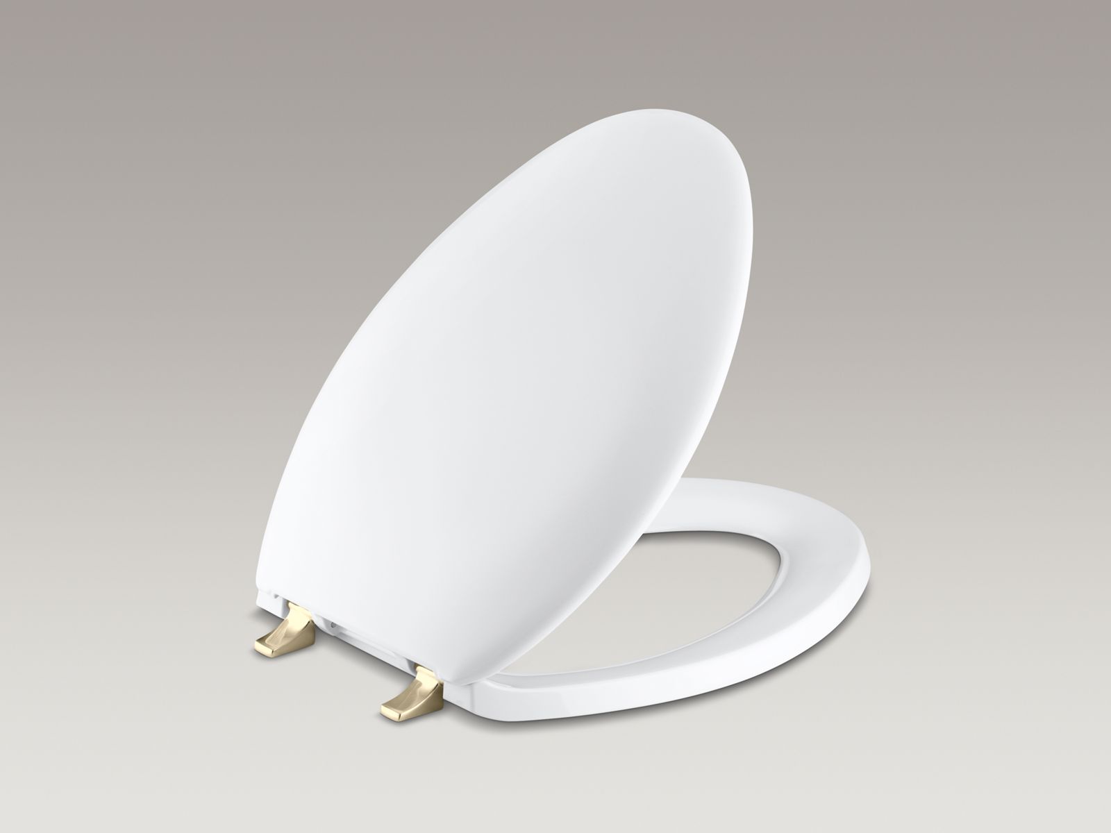 Bancroft(R) elongated closed-front toilet seat with Vibrant(R) French Gold hinges