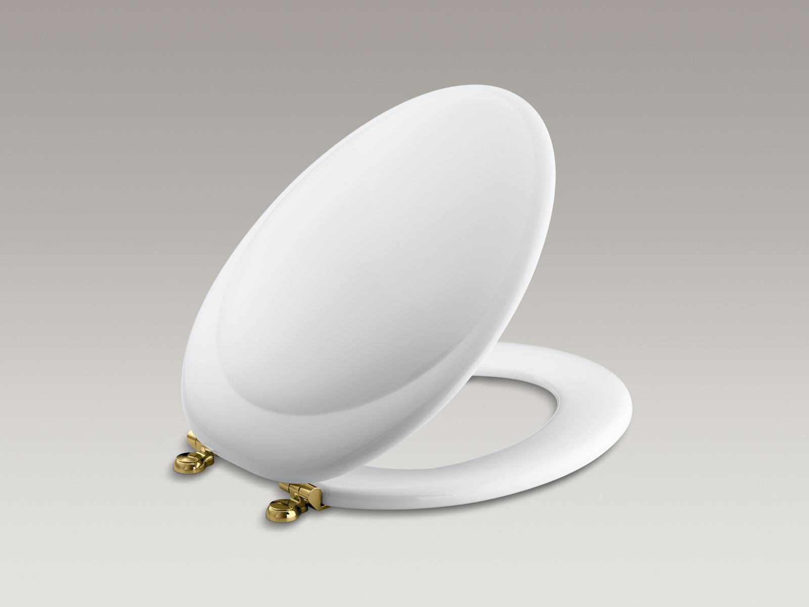 Revival(R) elongated toilet seat with Polished Brass hinges