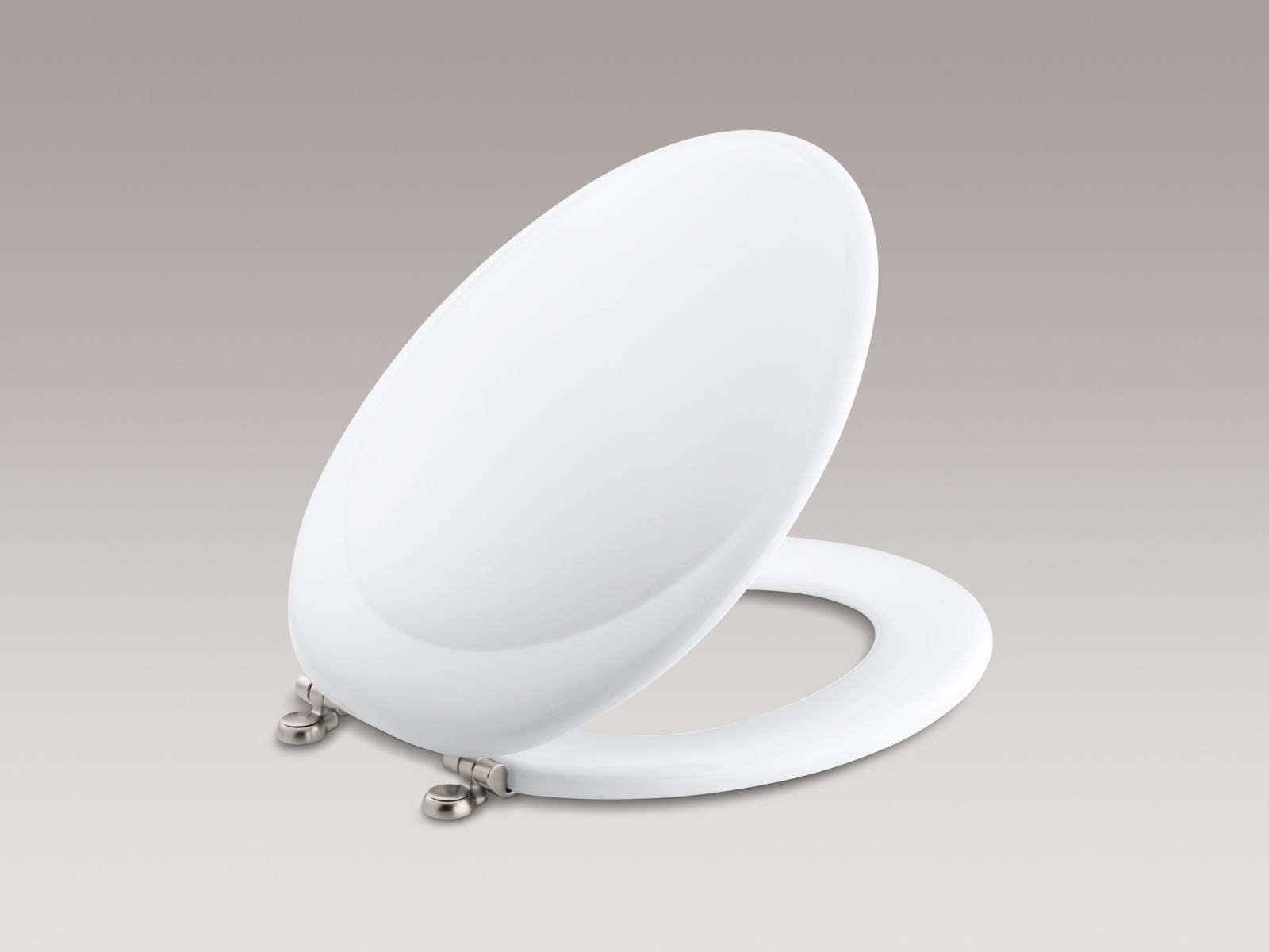 Revival(R) elongated toilet seat with Vibrant(R) Brushed Nickel hinges