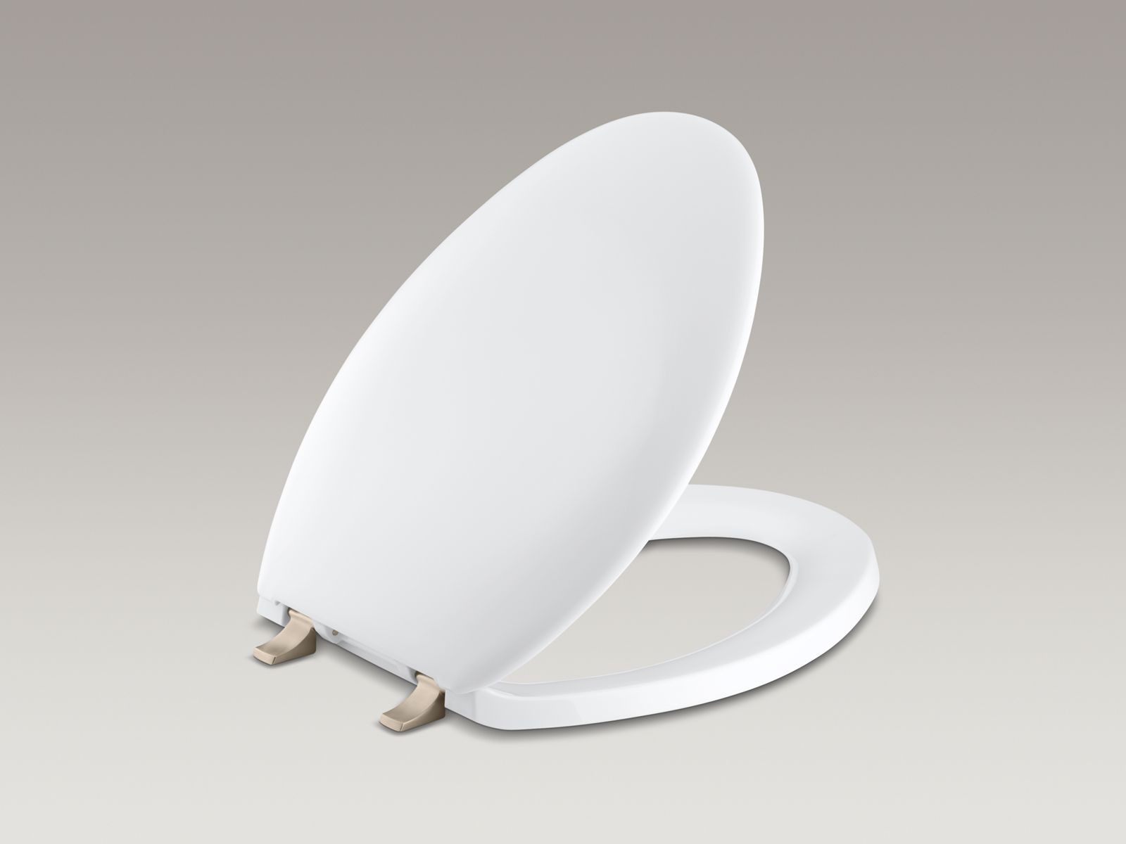 Bancroft(R) elongated closed-front toilet seat with Vibrant(R) Brushed Bronze hinges