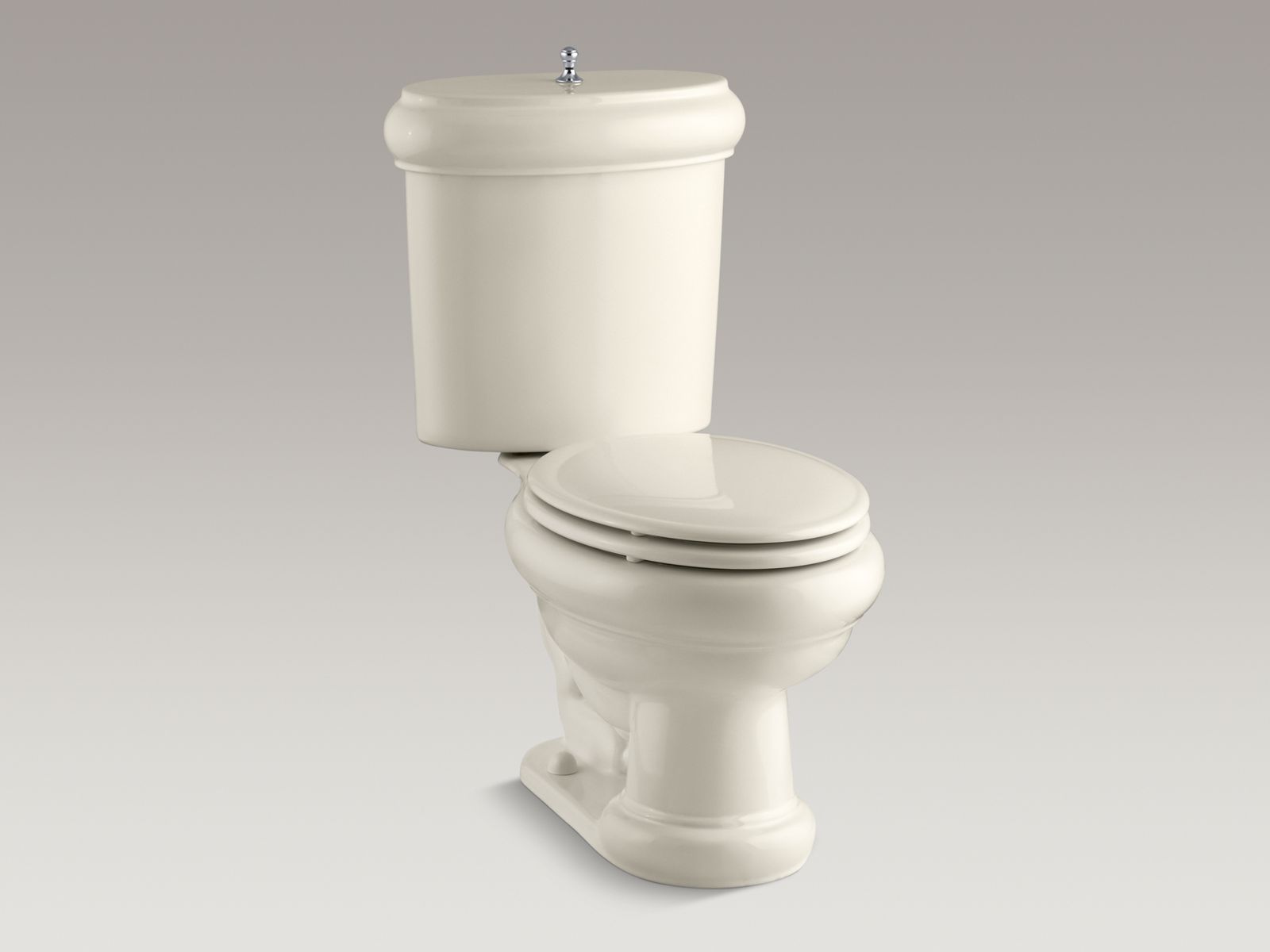 55020-revival-r-two-piece-elongated-1-6-gpf-toilet-with-seat-polished-chrome-flush-actuator-and-trim-3.jpg Revival(R) two-piece elongated 1.6 GPF toilet with seat, Polished Chrome flush actuator and trim