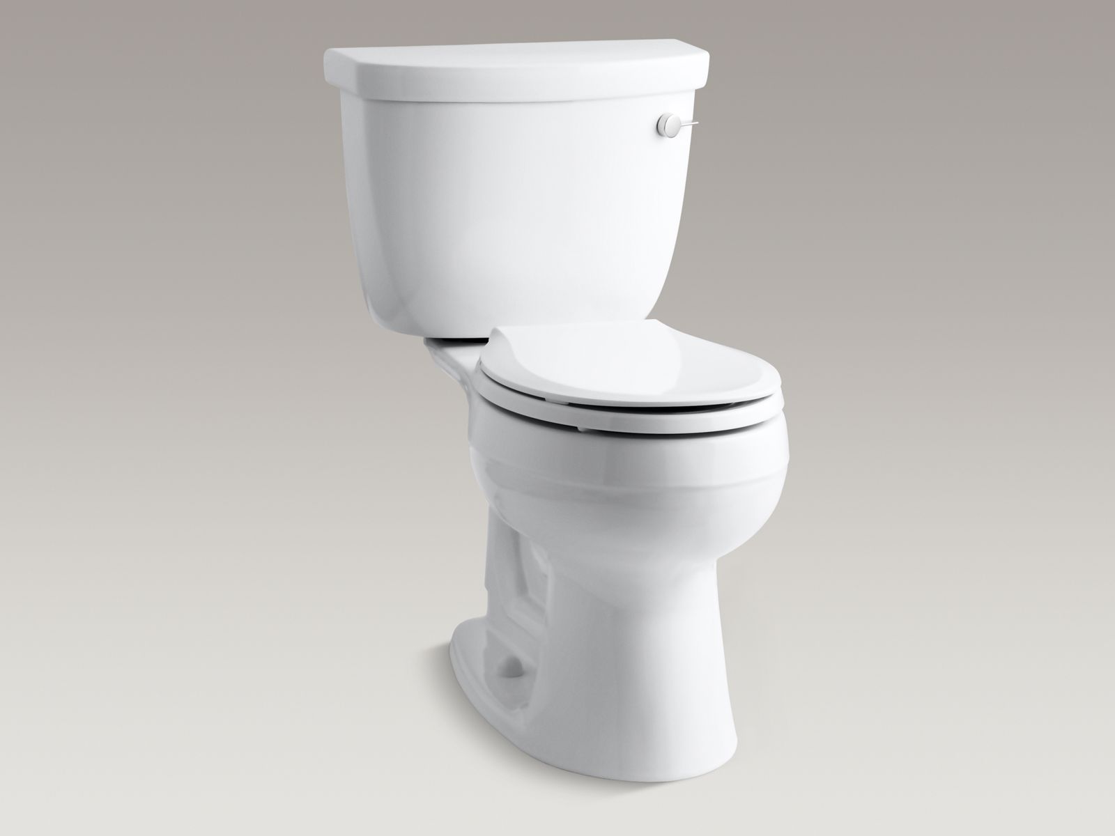 Cimarron(R) Comfort Height(R) two-piece round-front 1.6 gpf toilet with right-hand trip lever, less seat