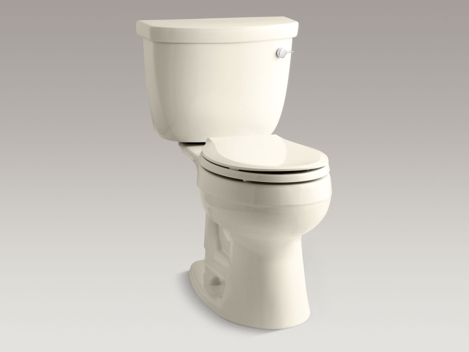 Cimarron(R) Comfort Height(R) two-piece round-front 1.6 gpf toilet with right-hand trip lever, less seat