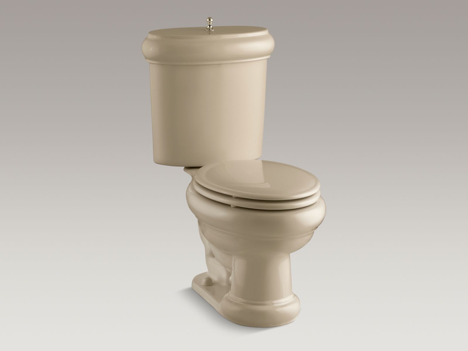 55378-revival-r-two-piece-elongated-1-6-gpf-toilet-with-seat-vibrant-r-french-gold-flush-actuator-and-trim-2.jpg Revival(R) two-piece elongated 1.6 GPF toilet with seat, Vibrant(R) French Gold flush actuator and trim