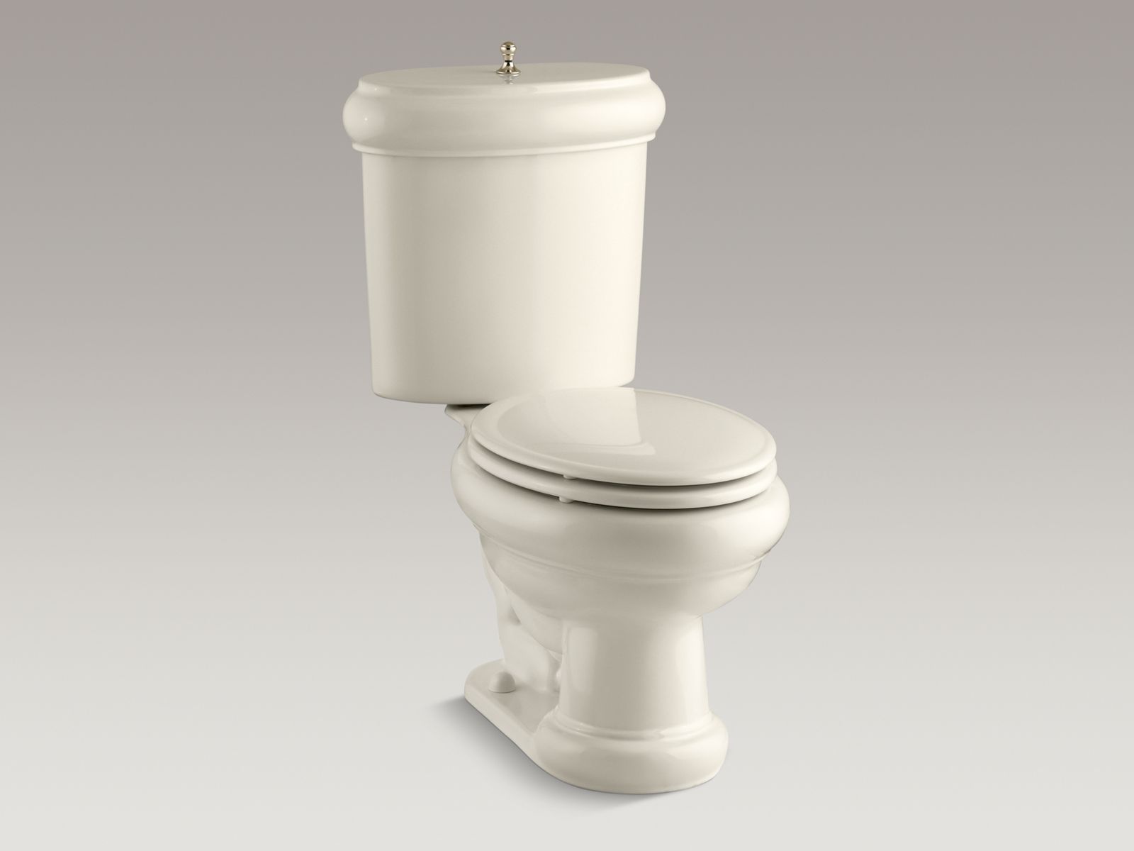 55378-revival-r-two-piece-elongated-1-6-gpf-toilet-with-seat-vibrant-r-french-gold-flush-actuator-and-trim-3.jpg Revival(R) two-piece elongated 1.6 GPF toilet with seat, Vibrant(R) French Gold flush actuator and trim