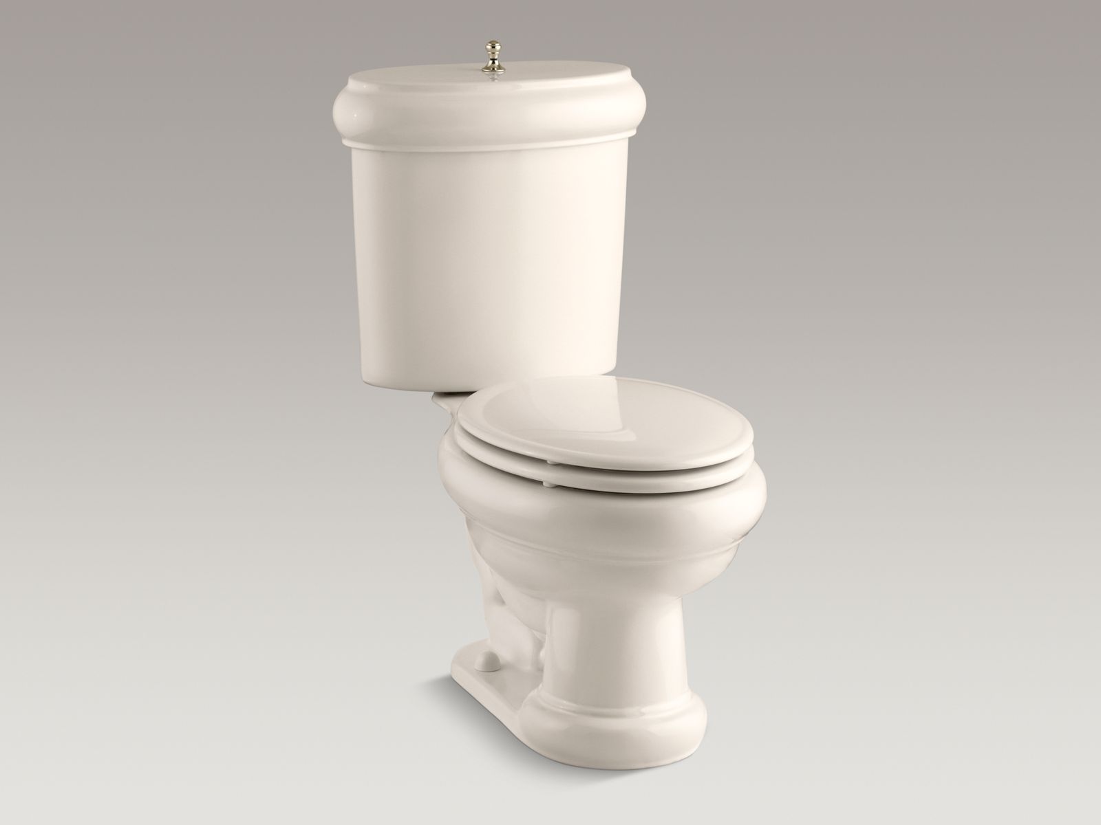 55378-revival-r-two-piece-elongated-1-6-gpf-toilet-with-seat-vibrant-r-french-gold-flush-actuator-and-trim-4.jpg Revival(R) two-piece elongated 1.6 GPF toilet with seat, Vibrant(R) French Gold flush actuator and trim