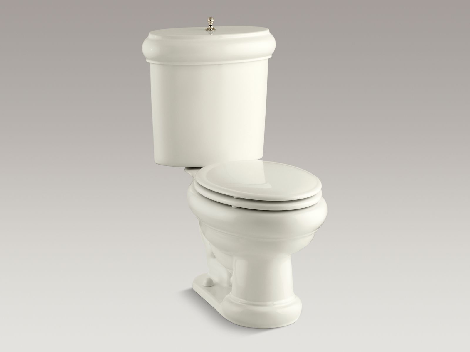 55378-revival-r-two-piece-elongated-1-6-gpf-toilet-with-seat-vibrant-r-french-gold-flush-actuator-and-trim-8.jpg Revival(R) two-piece elongated 1.6 GPF toilet with seat, Vibrant(R) French Gold flush actuator and trim