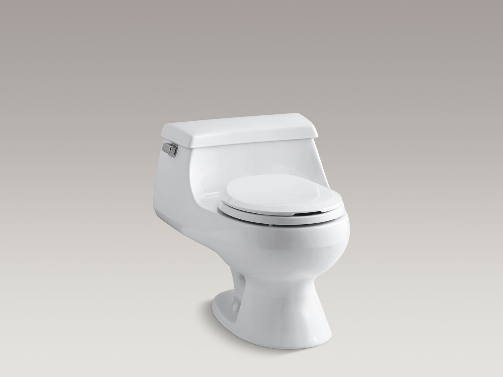Rialto(R) one-piece round-front toilet with Brevia(TM) toilet seat and left-hand trip lever