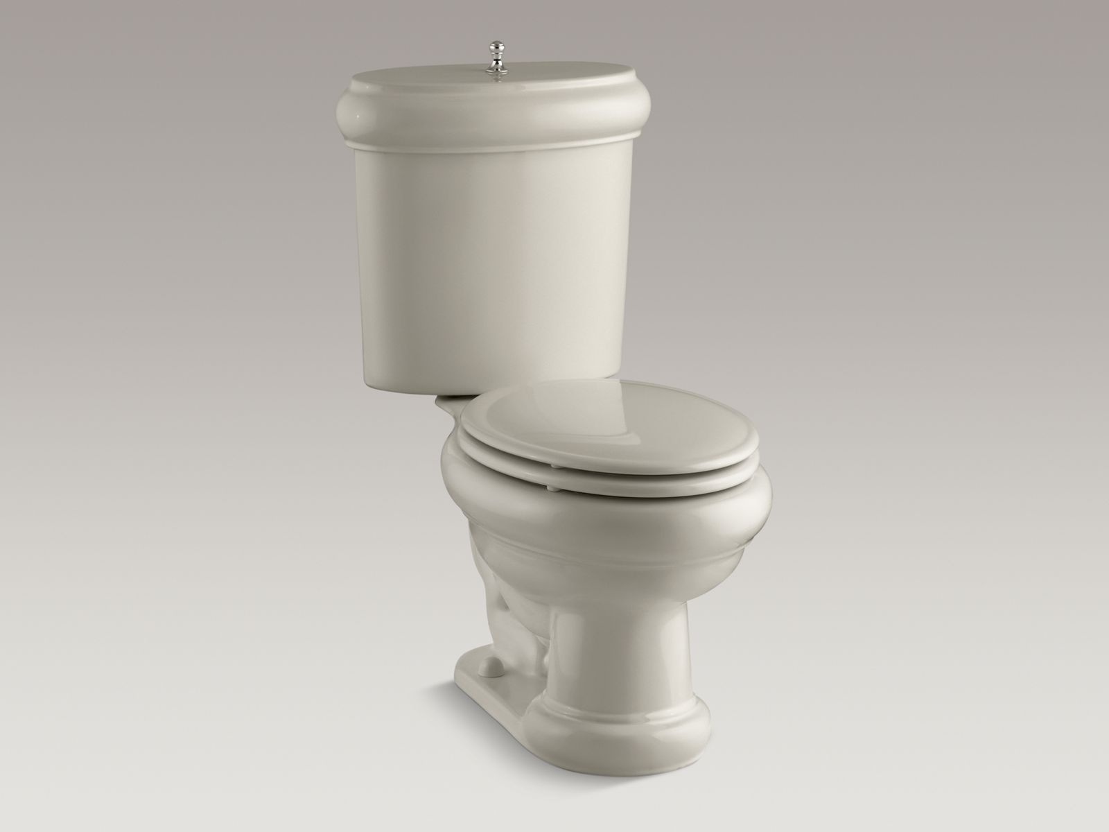 57037-revival-r-two-piece-elongated-1-6-gpf-toilet-with-seat-vibrant-r-polished-nickel-flush-actuator-and-trim-9.jpg Revival(R) two-piece elongated 1.6 GPF toilet with seat, Vibrant(R) Polished Nickel flush actuator and trim