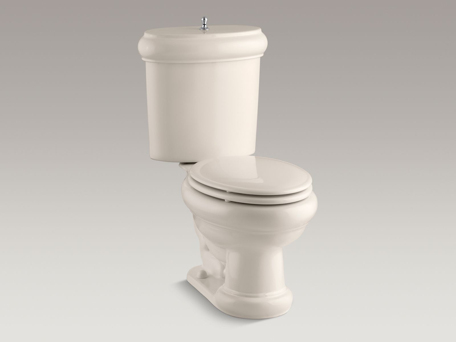 57208-revival-r-two-piece-elongated-1-6-gpf-toilet-with-seat-brushed-chrome-flush-actuator-and-trim-4.jpg Revival(R) two-piece elongated 1.6 GPF toilet with seat, Brushed Chrome flush actuator and trim