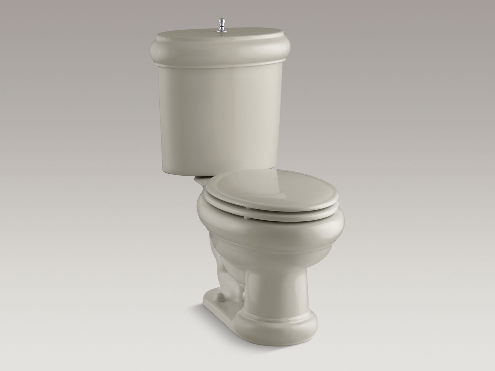 57208-revival-r-two-piece-elongated-1-6-gpf-toilet-with-seat-brushed-chrome-flush-actuator-and-trim-9.jpg Revival(R) two-piece elongated 1.6 GPF toilet with seat, Brushed Chrome flush actuator and trim